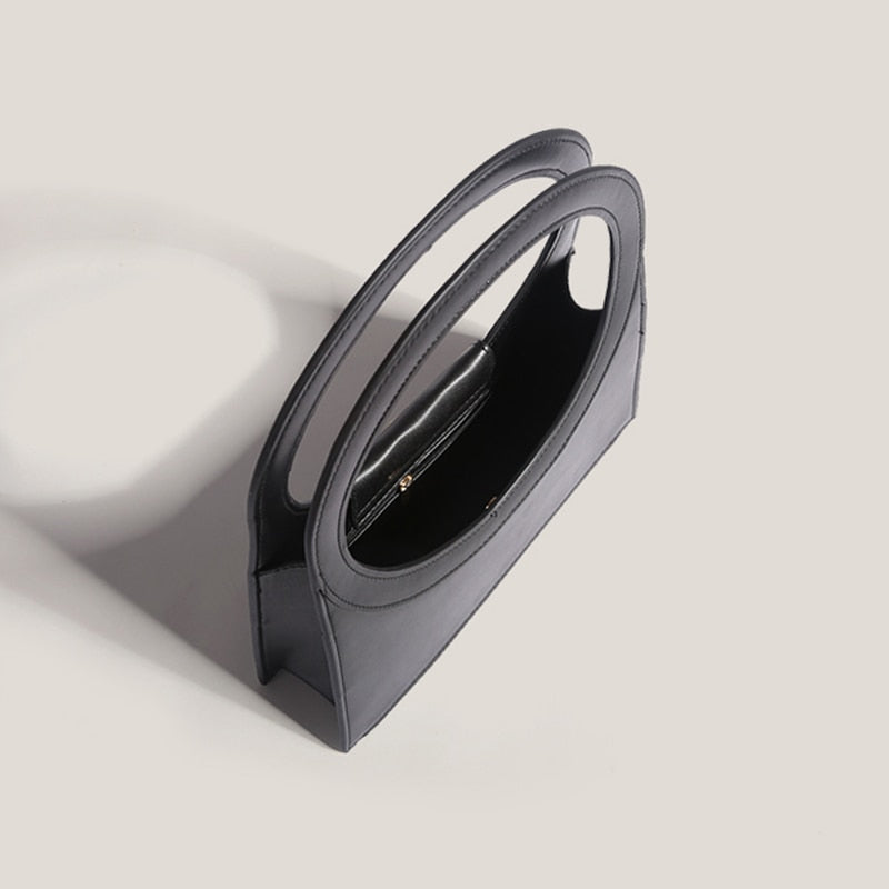 Sculptural Ring Handle Mini Handbag