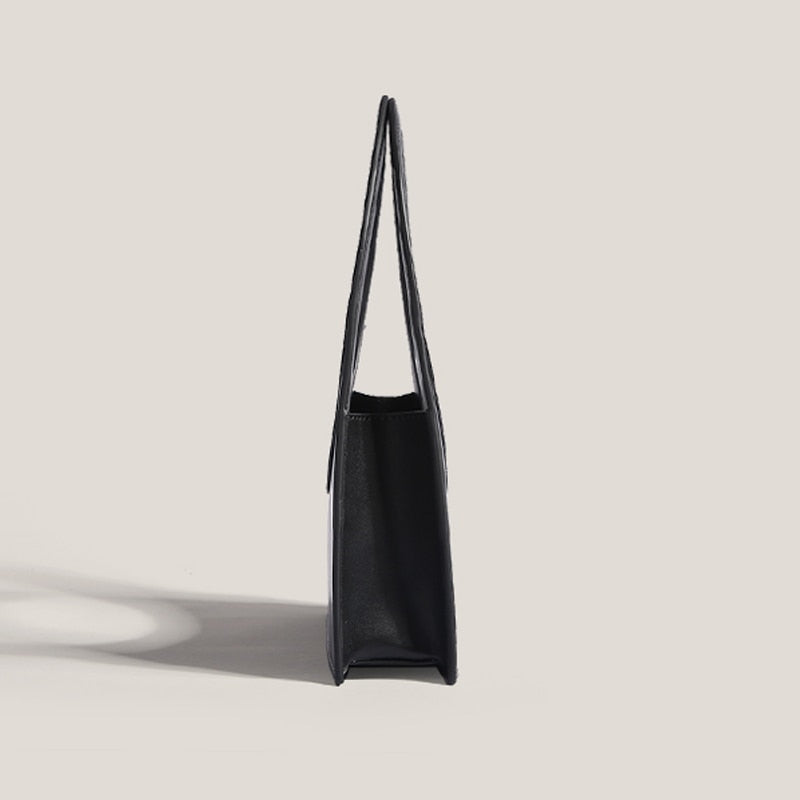 Sculptural Ring Handle Mini Handbag